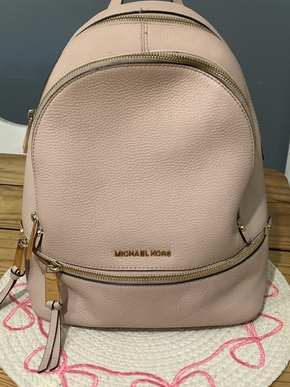Michael Kors Pale Pink Pebbled Leather Mini Backpack with Gold Hardware